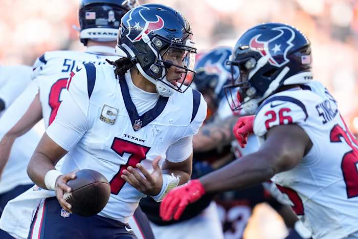 C.J. Stroud rolls out in the second quarter of the NFL Week 10 game between the Cincinnati Bengals and the Texans